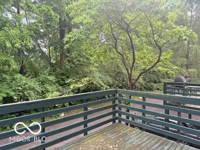 6639 N College Ave, Indianapolis, IN 46220 - deck featuring a wooded view