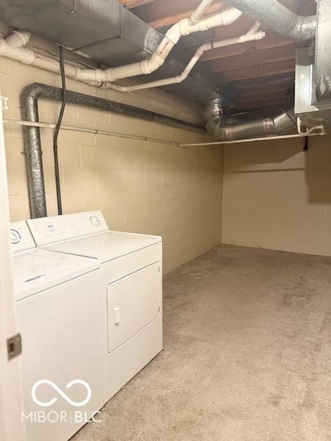 6639 N College Ave, Indianapolis, IN 46220 - washroom with independent washer and dryer, concrete block wall, and light carpet