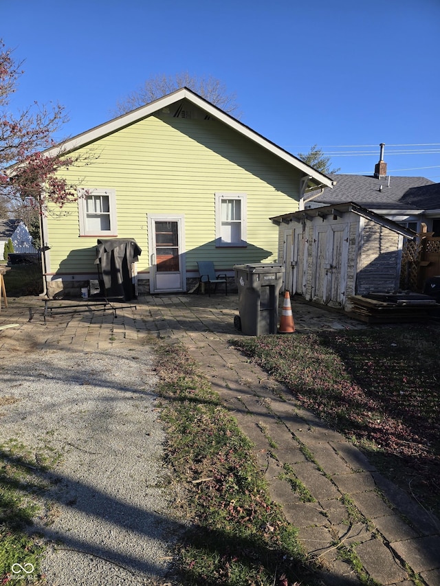 back of house featuring a patio