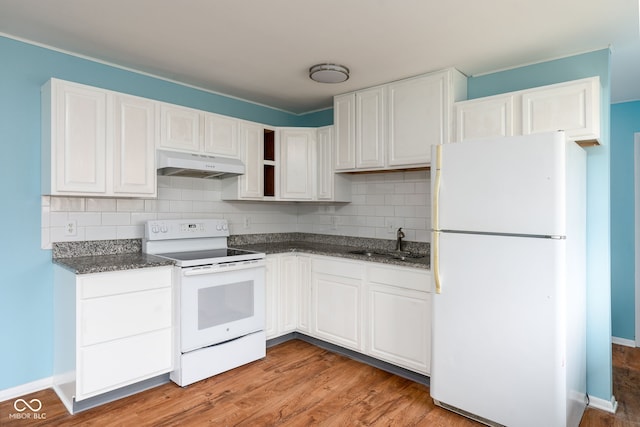 kitchen featuring white cabinetry, sink, white appliances, and decorative backsplash