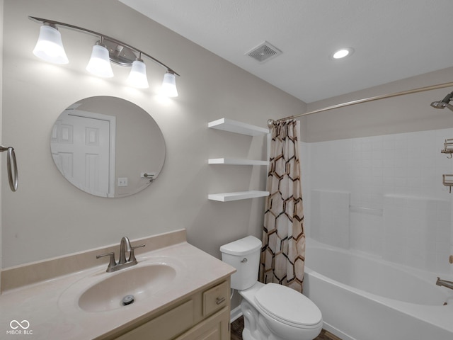 full bathroom with vanity, toilet, and shower / bath combo with shower curtain