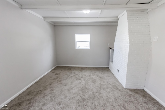 empty room featuring light colored carpet