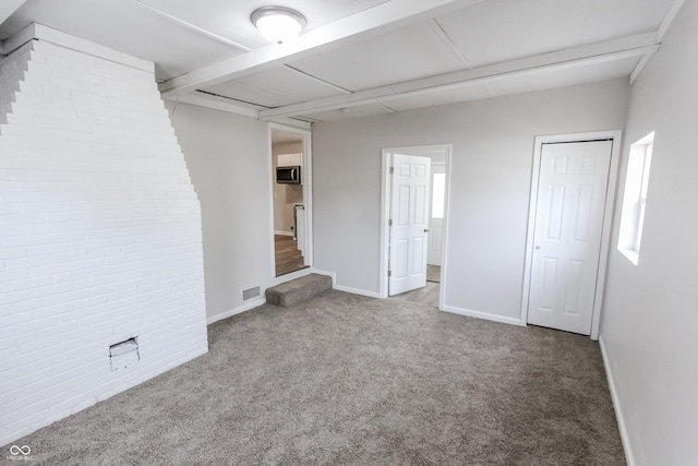 unfurnished bedroom featuring light colored carpet