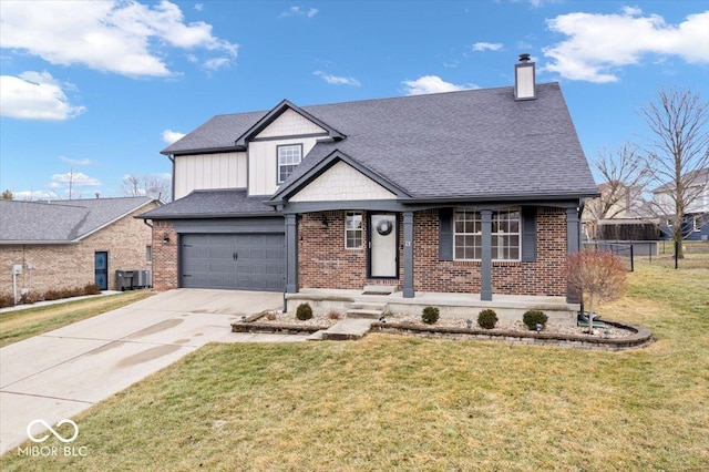 view of front of home featuring a garage, a front yard, and central air condition unit