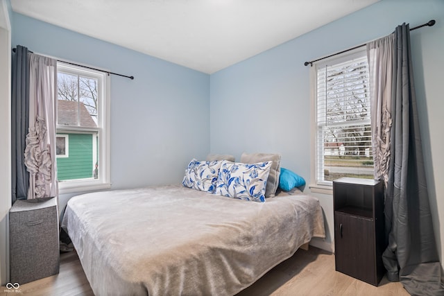 bedroom featuring light wood-type flooring