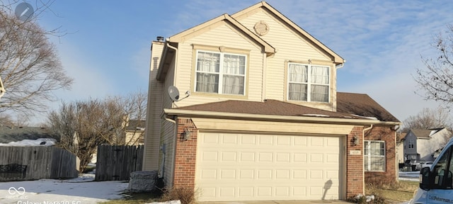 view of front of property with a garage