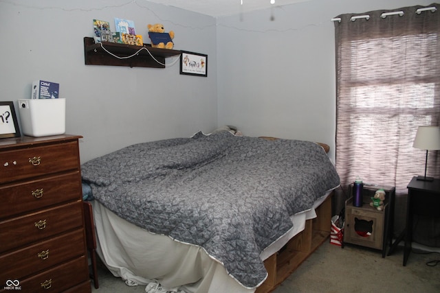 bedroom with light carpet