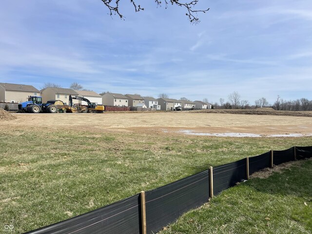 7842 Cork Bend Ln, Indianapolis, IN 46239 - view of yard with a residential view and fence