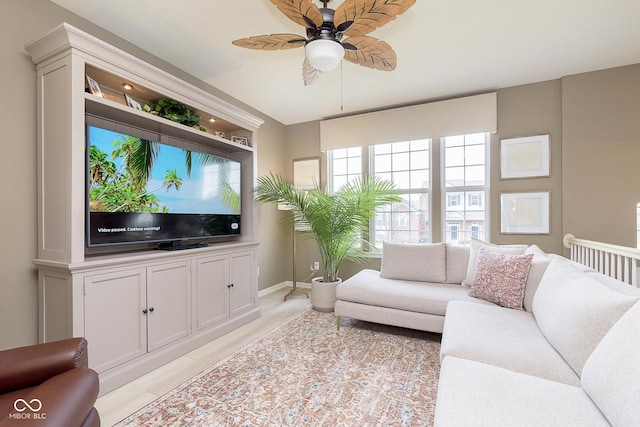 living room featuring ceiling fan