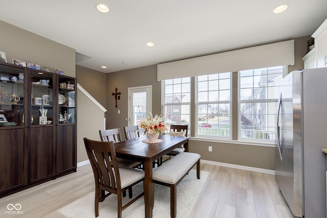 dining space featuring light hardwood / wood-style floors