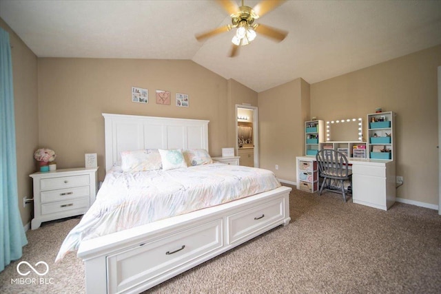 bedroom with ceiling fan, vaulted ceiling, and light carpet