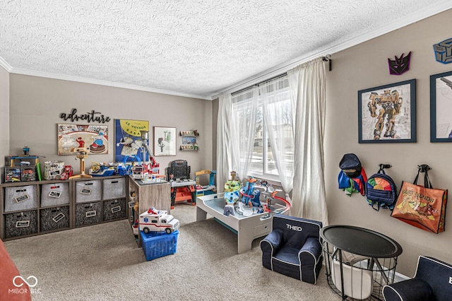 rec room with ornamental molding, carpet flooring, and a textured ceiling