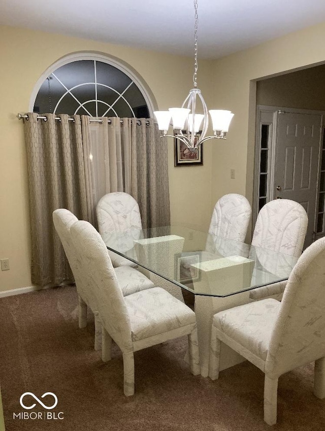 dining area featuring carpet flooring