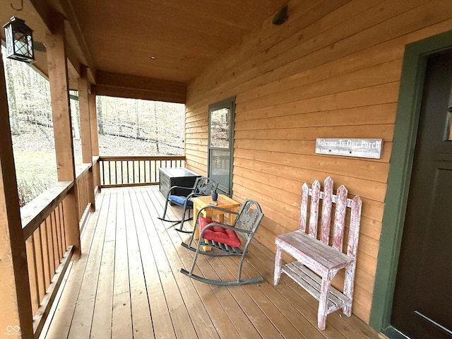 wooden deck featuring a porch