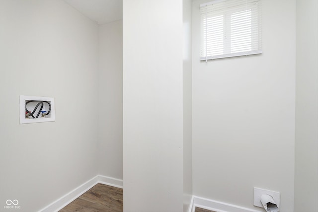 washroom with hookup for a washing machine and wood-type flooring