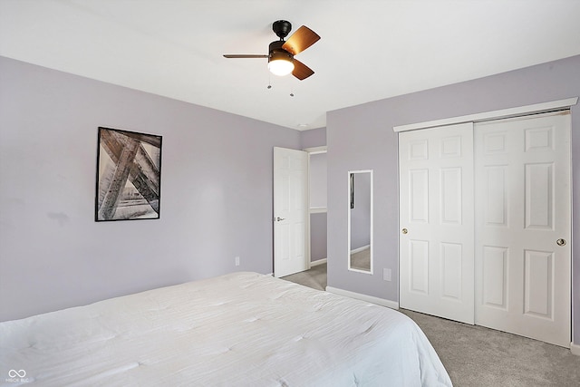 bedroom with light carpet, a closet, and ceiling fan