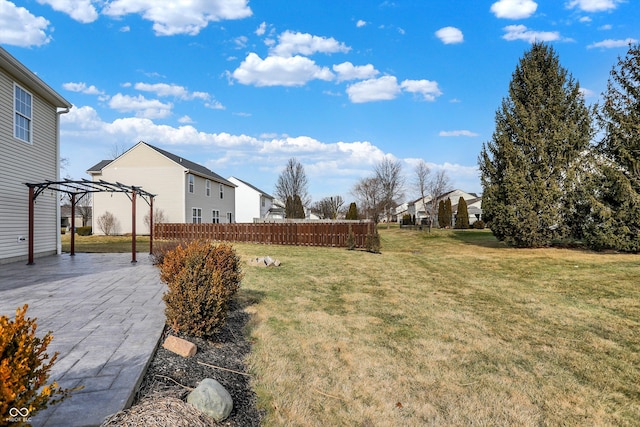 view of yard with a patio area and a pergola