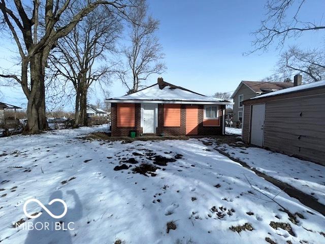 view of snow covered property