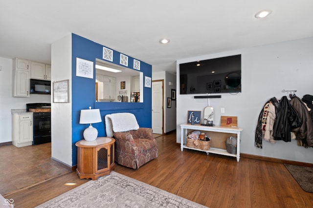 living area featuring dark hardwood / wood-style floors