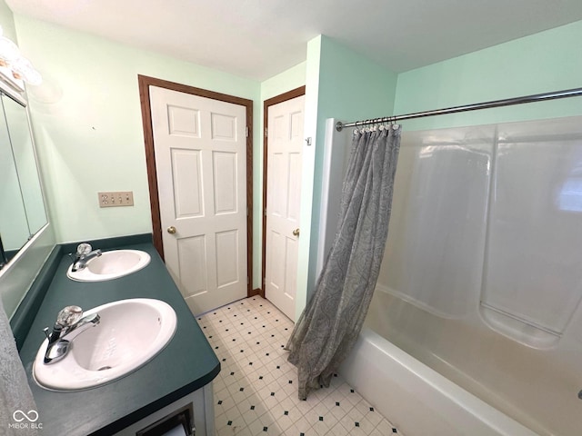 bathroom with shower / bath combination with curtain and vanity