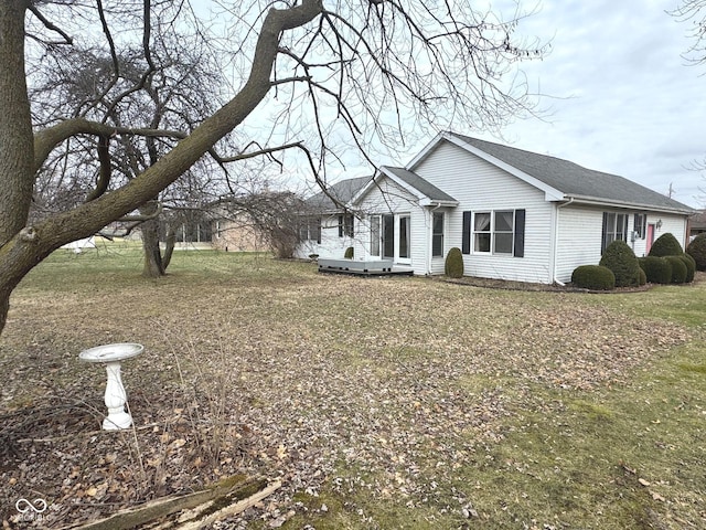 ranch-style home with a front yard