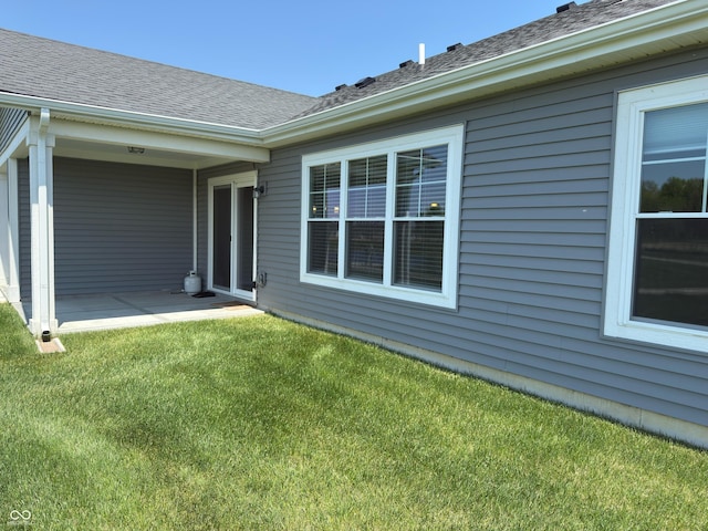 19438 Astoria Ave, Sheridan, IN 46069 - entrance to property with a yard, a patio, and a shingled roof