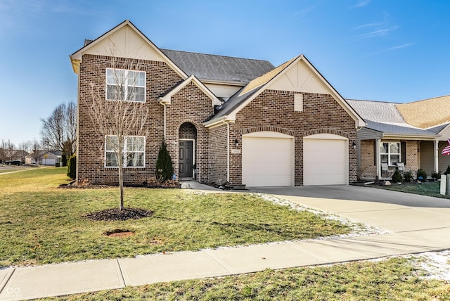 traditional-style house featuring a garage, driveway, a front lawn, and brick siding