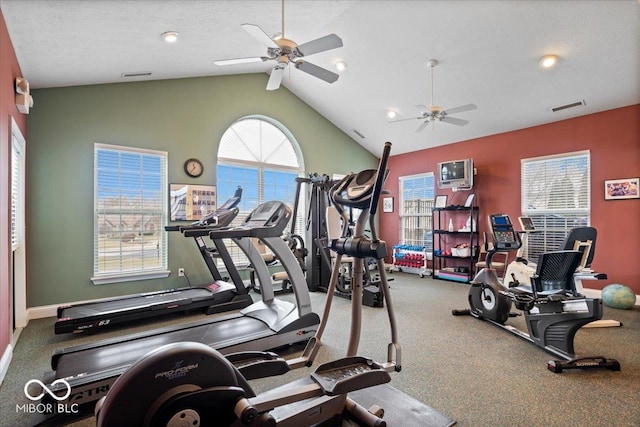 gym with vaulted ceiling, a textured ceiling, and ceiling fan