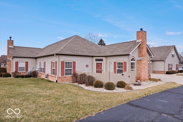 view of front of home with a front yard