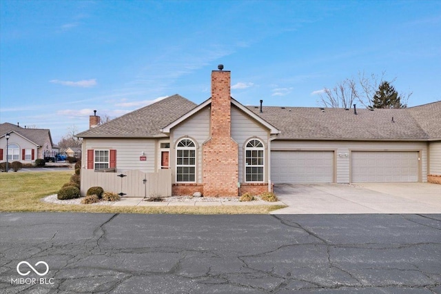 ranch-style home with a garage