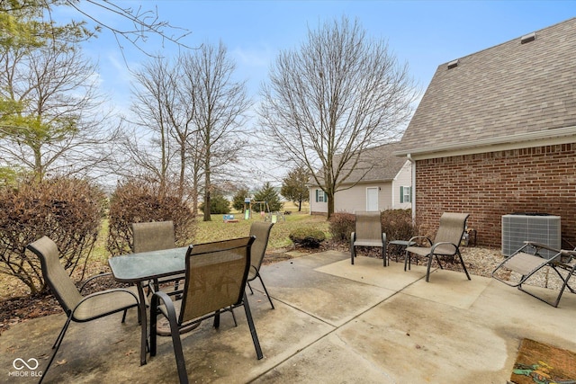 view of patio / terrace with central AC unit and a playground