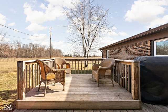 wooden terrace featuring grilling area