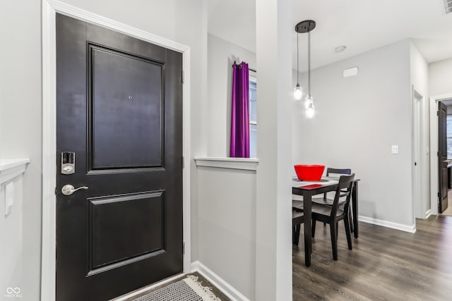 interior space with dark hardwood / wood-style floors