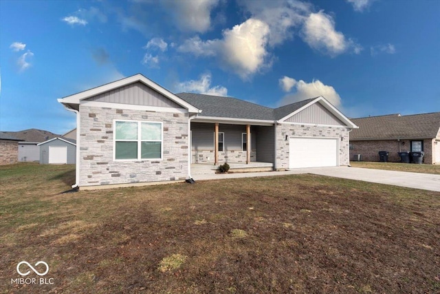 view of front of property with a garage, a front lawn, and covered porch