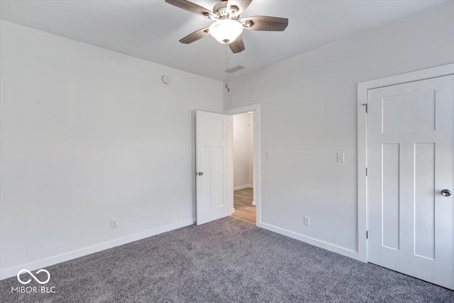 unfurnished bedroom with carpet and ceiling fan