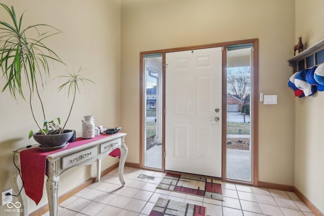 entrance foyer featuring light tile patterned floors