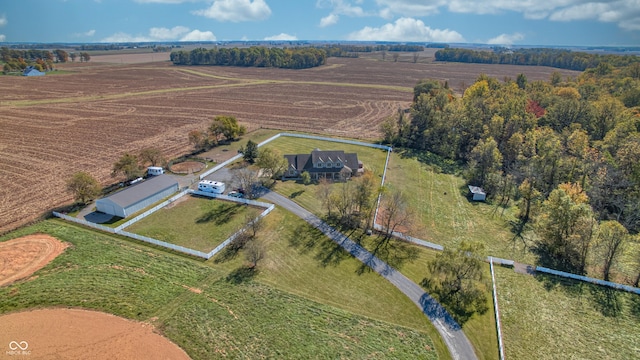 birds eye view of property featuring a rural view