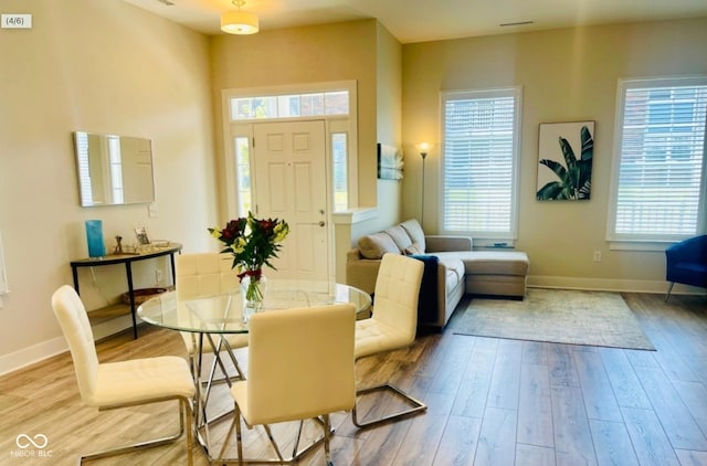 dining room featuring light hardwood / wood-style floors