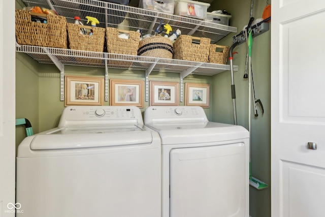 laundry area with washing machine and dryer