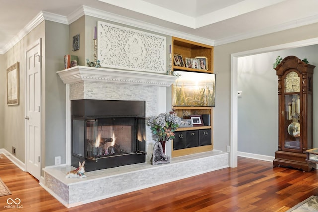 room details featuring hardwood / wood-style flooring and crown molding