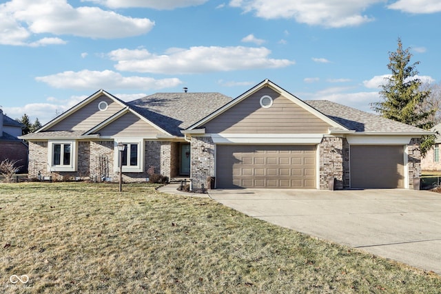 view of front of house with a garage and a front yard