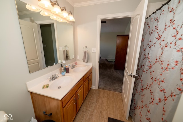 bathroom featuring crown molding, vanity, and walk in shower