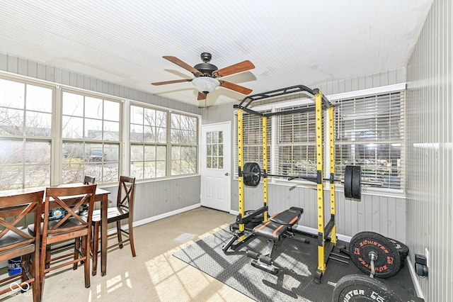 exercise room with ceiling fan