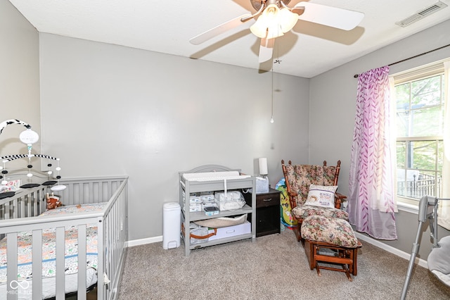 bedroom featuring carpet and ceiling fan