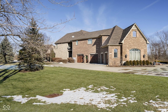 exterior space featuring a garage and a front lawn