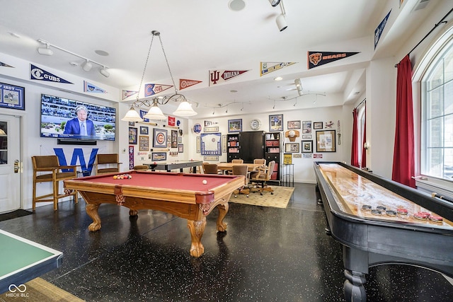 recreation room with pool table and rail lighting