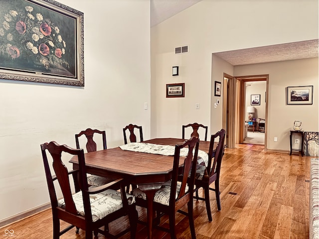 dining room featuring light hardwood / wood-style flooring