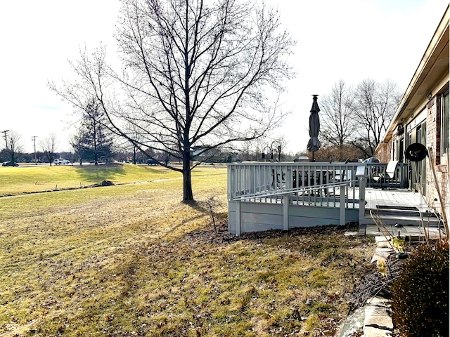 view of yard with a deck