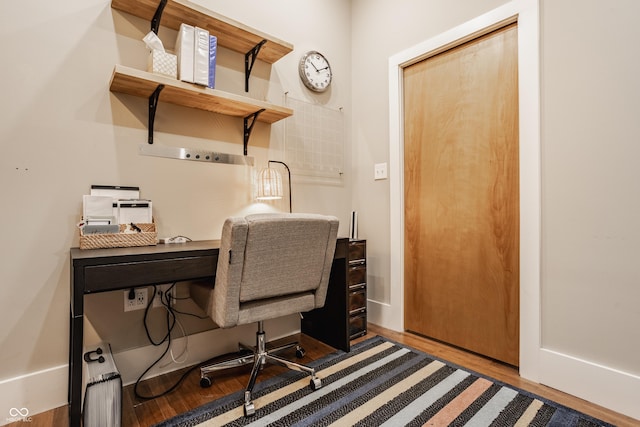 office space with hardwood / wood-style flooring