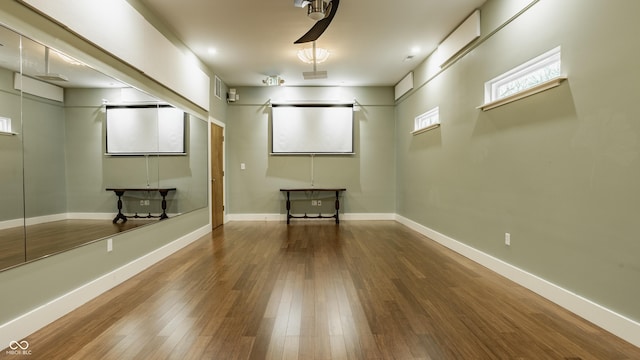 basement featuring hardwood / wood-style flooring